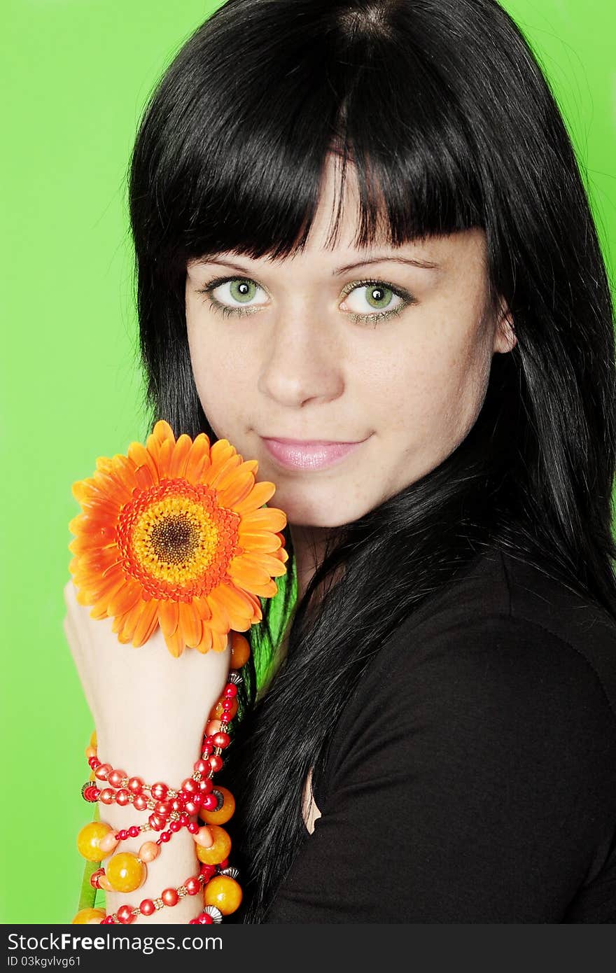 Woman holds gerbera