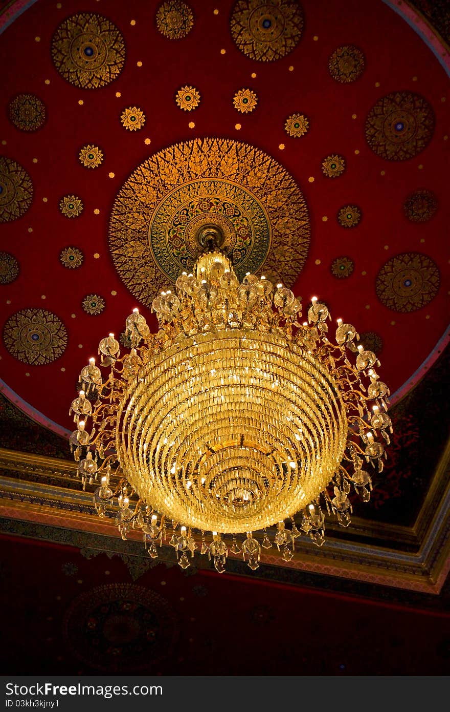 The huge old antique chandelier from the ceiling of a Buddhist temple