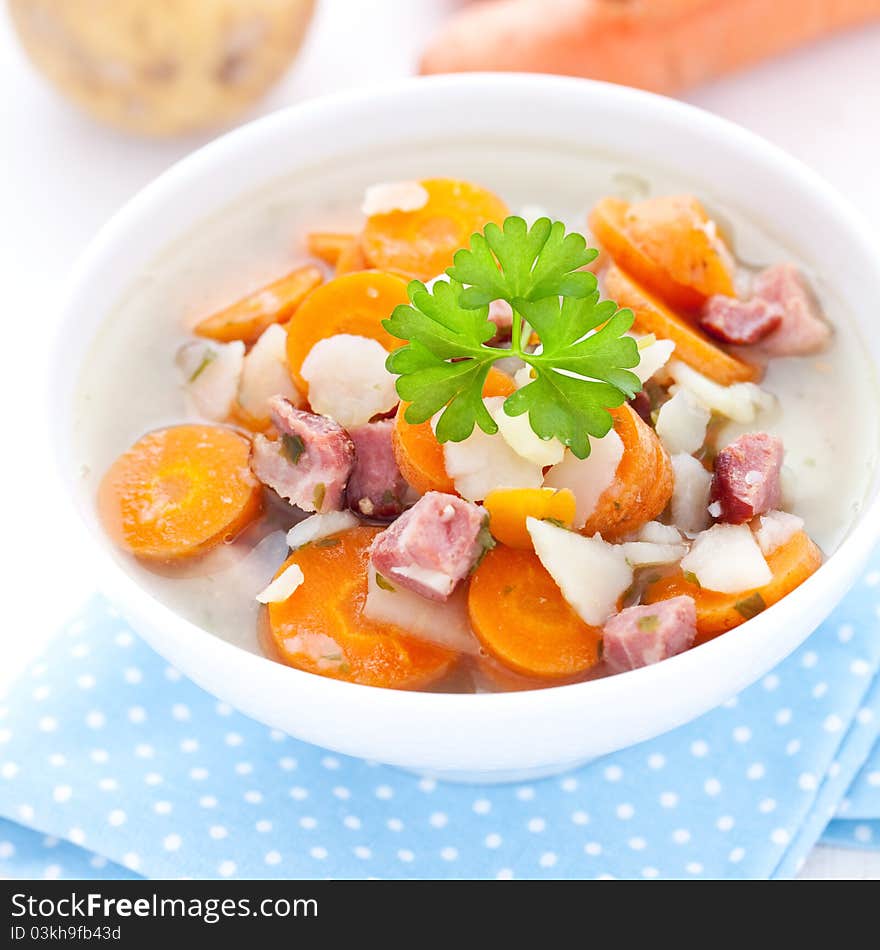 Fresh carrot soup with smoked pork