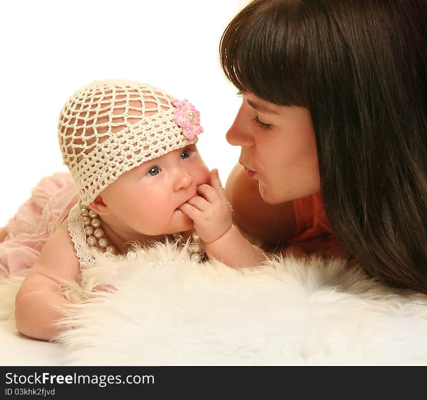 Young mother with baby on white background. Young mother with baby on white background