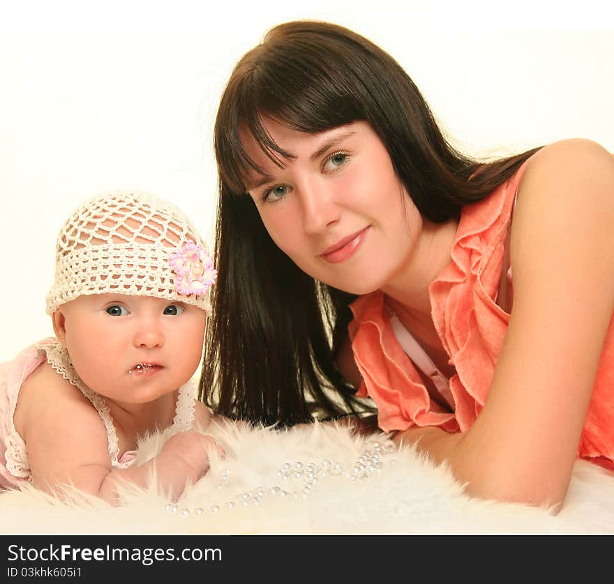 Young mother with baby on white background. Young mother with baby on white background