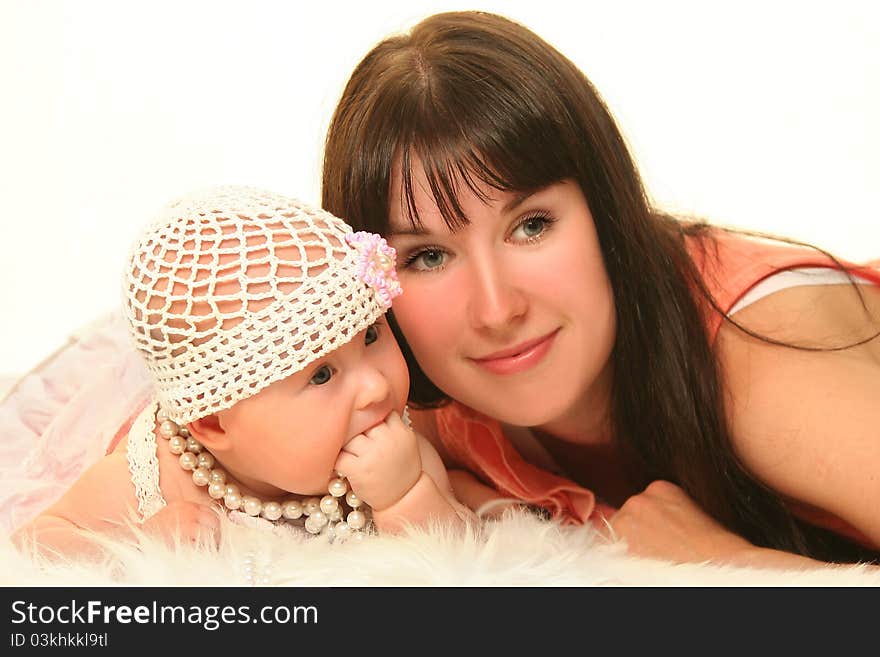 Young mother with baby on white background. Young mother with baby on white background