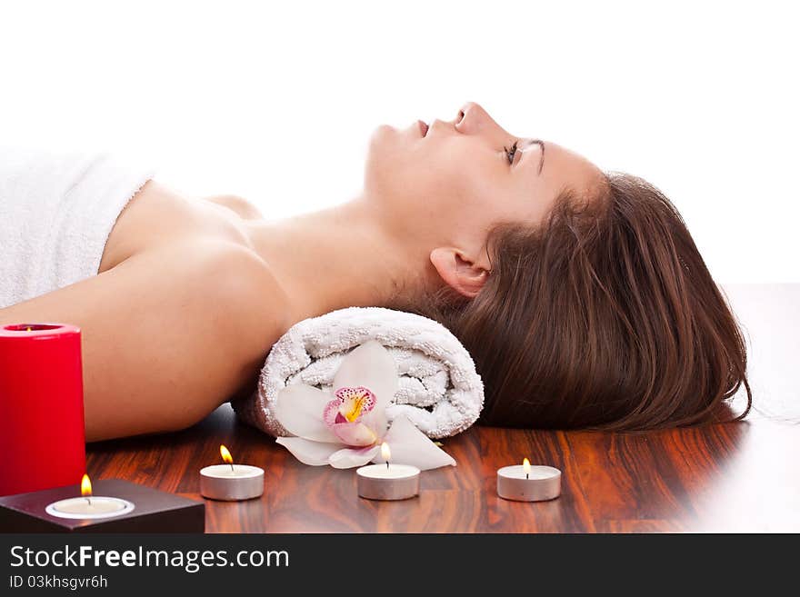 Portrait of young beautiful woman in spa environment