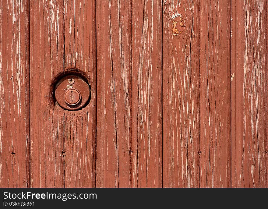 The old wooden door with a mortise lock