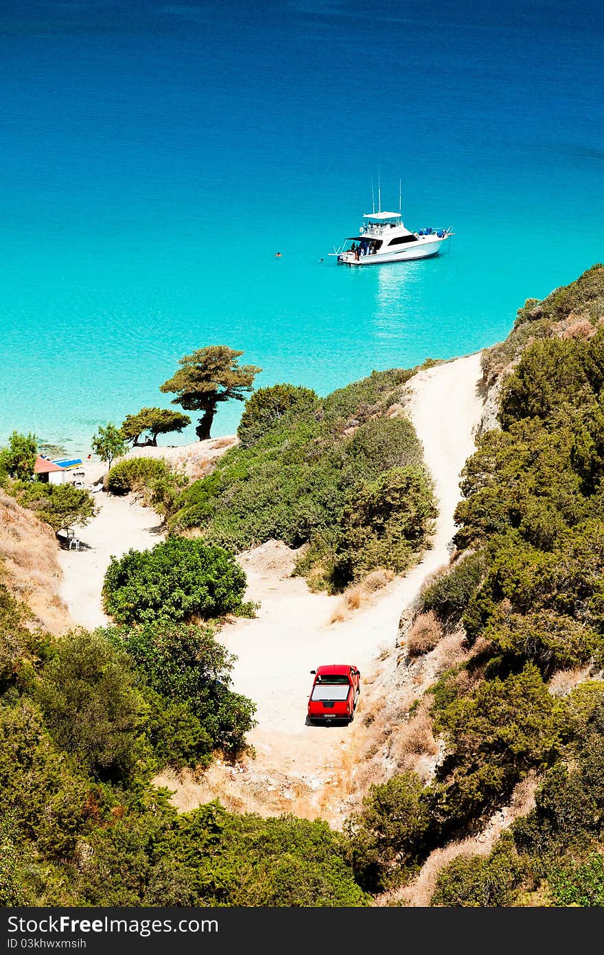 Ship anchored in beautiful bay with turquoise water. Crete, Greece. Ship anchored in beautiful bay with turquoise water. Crete, Greece.