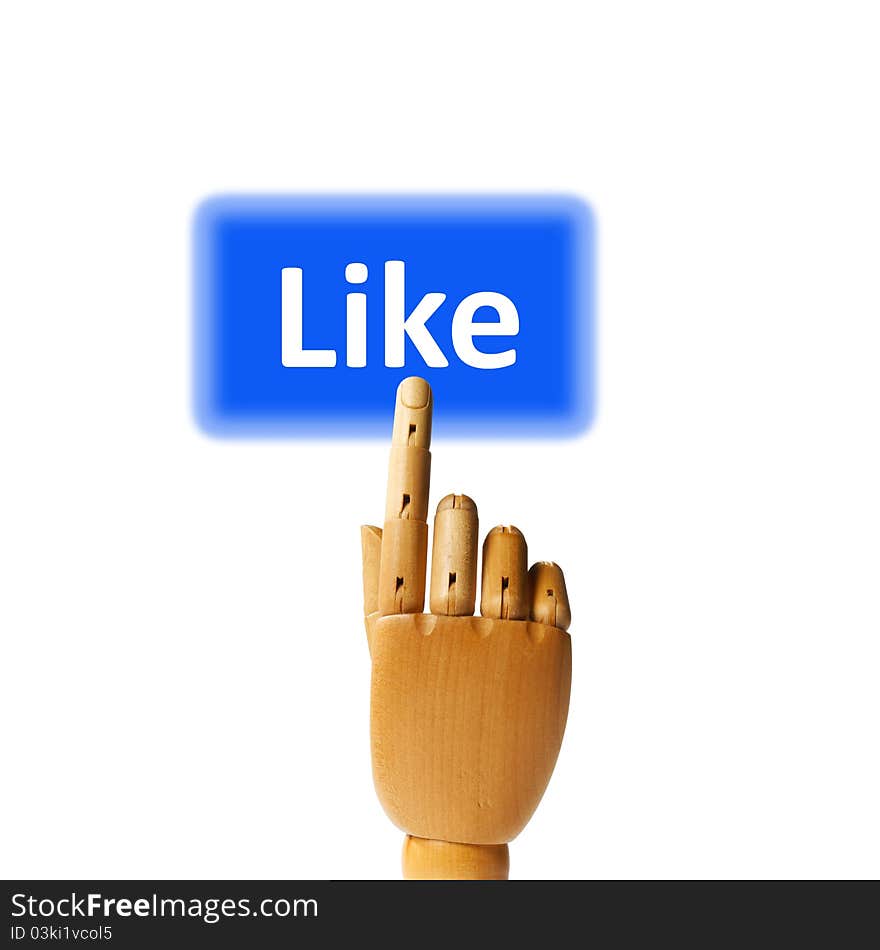 Wooden finger pressing a like button