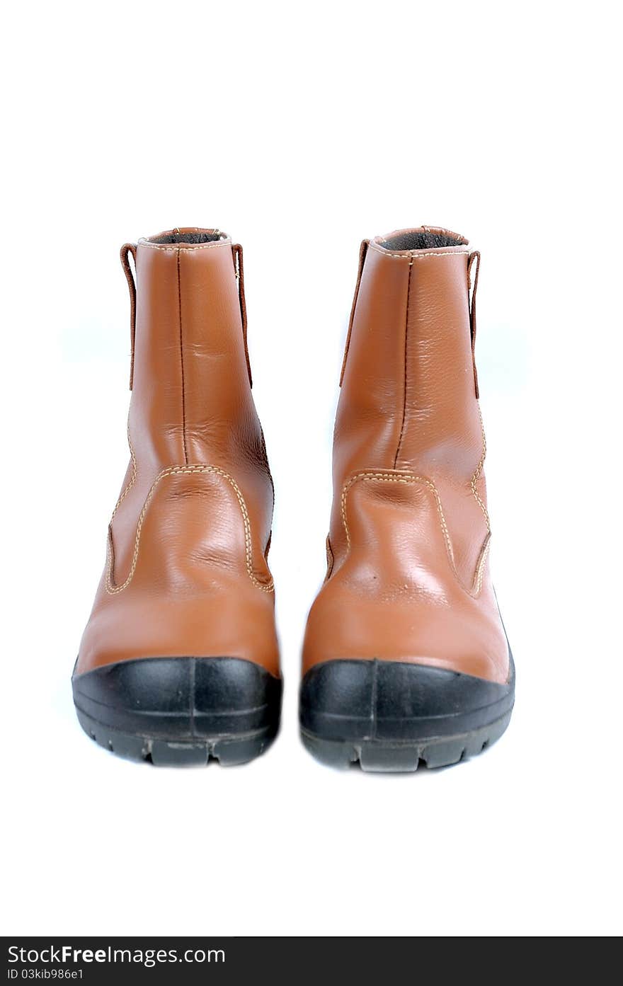 A pair of brown leather boots