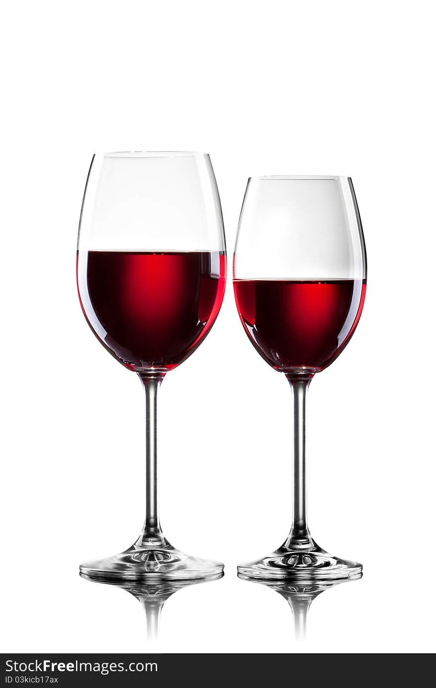 Red Wine In Glasses  On White