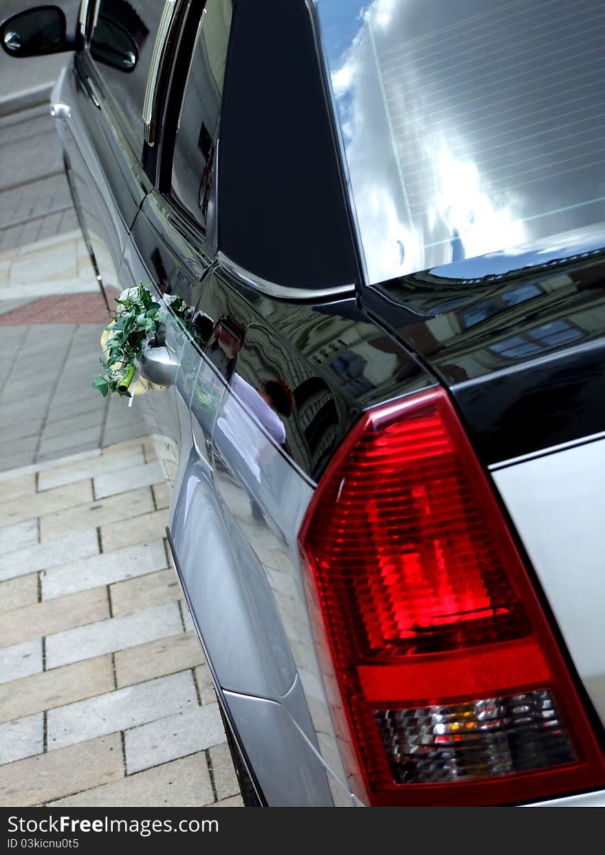 Luxury wedding limousine with bouquet