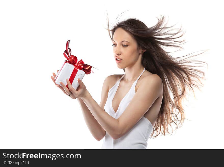 Beautiful woman holding gift isolated