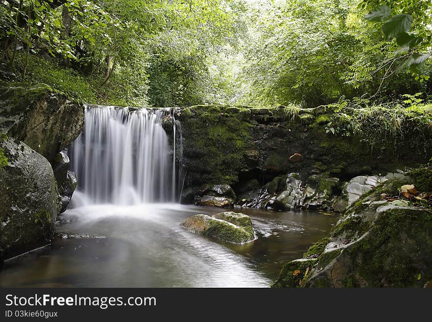 Waterfall in a mountain river