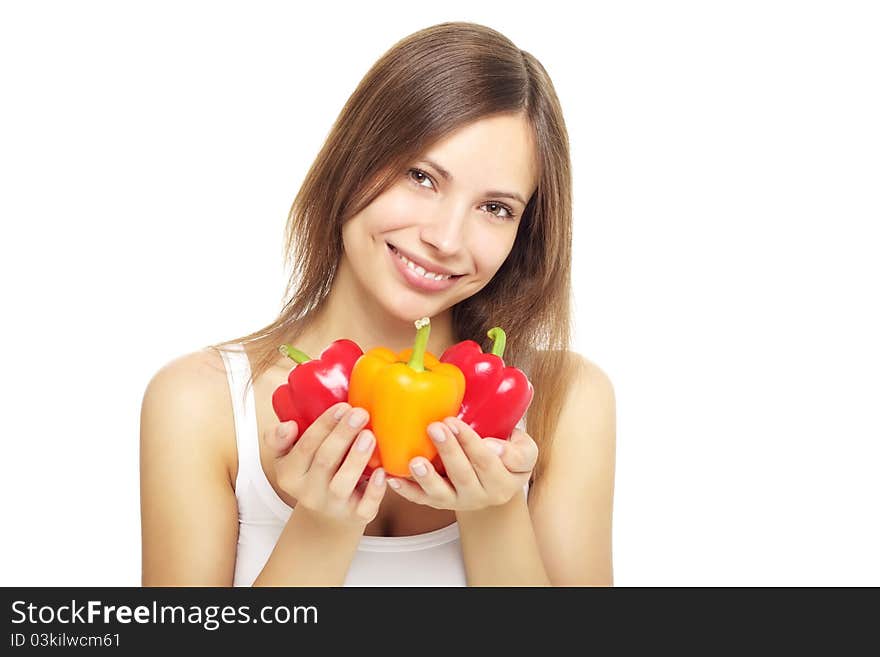 Girl with bell peppers isolated on white