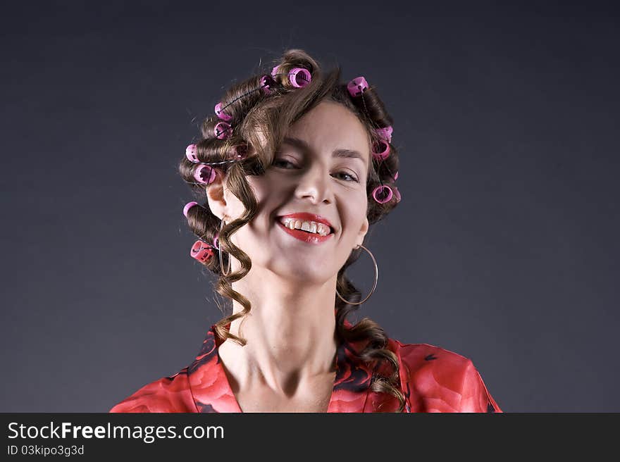 Beautiful Young Woman With Bigoudi On The Hair