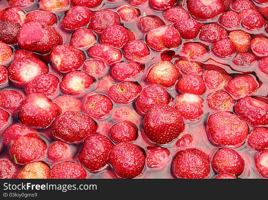 Ripe strawberry macro close-up of delicious berries isolated. Ripe strawberry macro close-up of delicious berries isolated