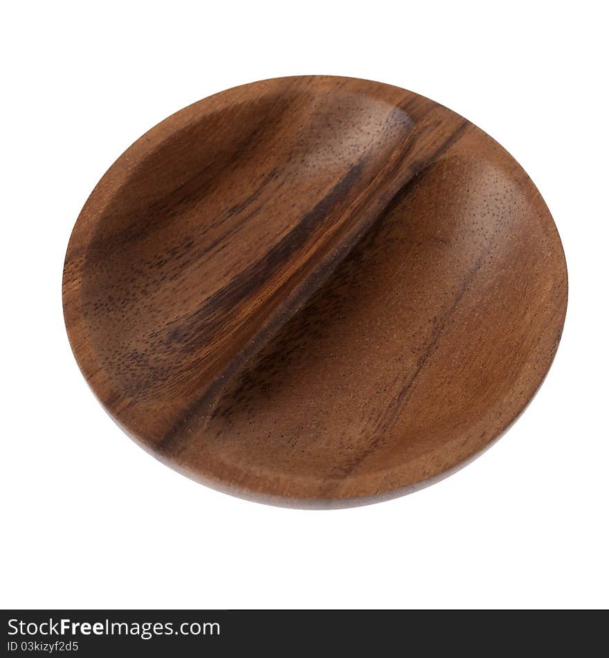 A dark wooden bowl on isolated white background