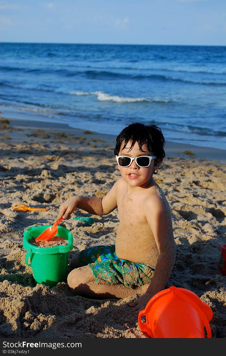 Adorable Hispanic Boy By The Pool