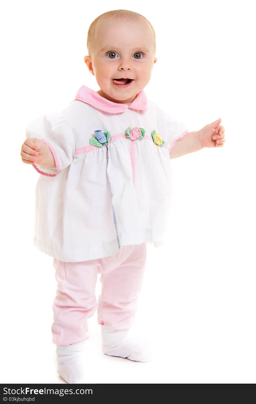 Baby in dress on a white background.