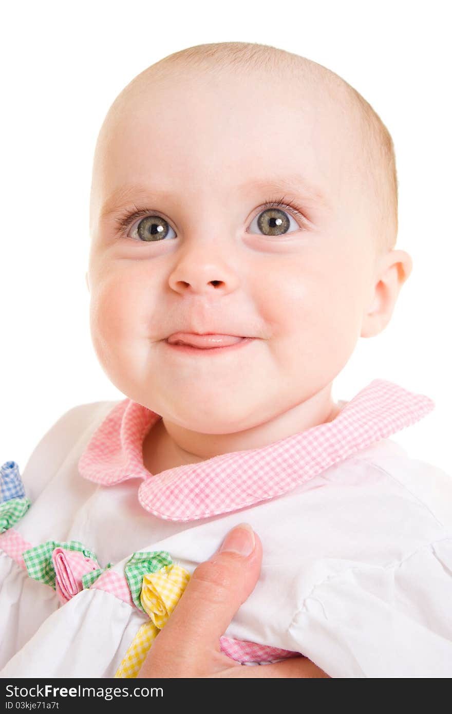 Smiling baby on a white background.