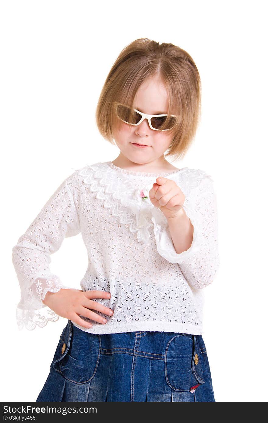 Child in sunglasses on white background.