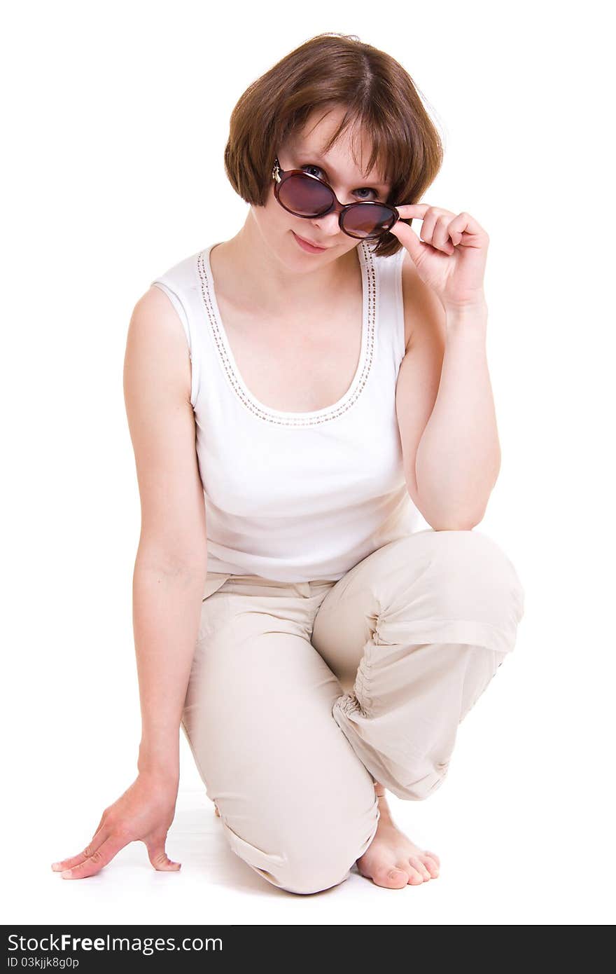 Woman in sunglasses on white background.