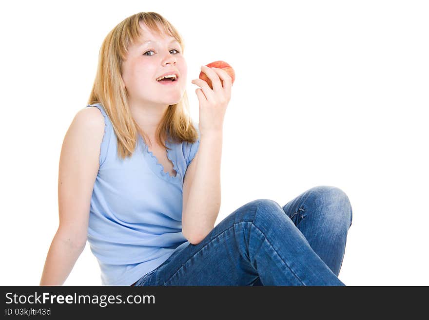 Girl with an apple on a white background.