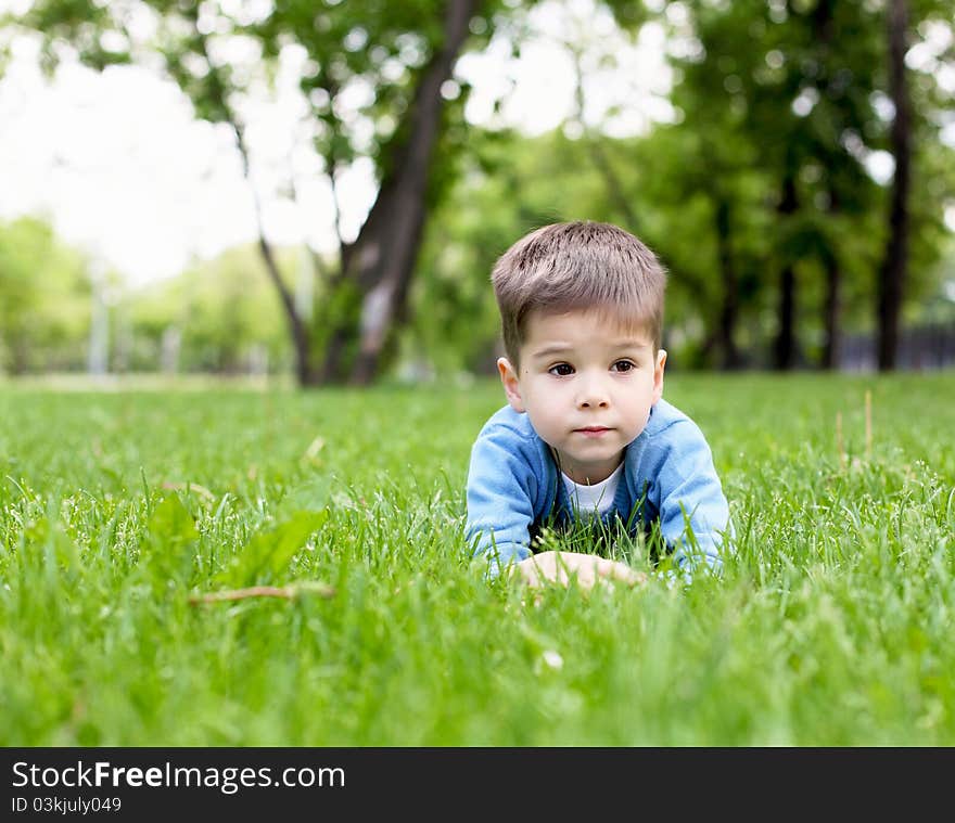 Portrait Of A Little Boy Outdoors