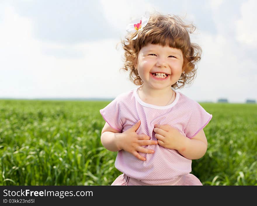 Portrait Of A Little Girl Outdoors