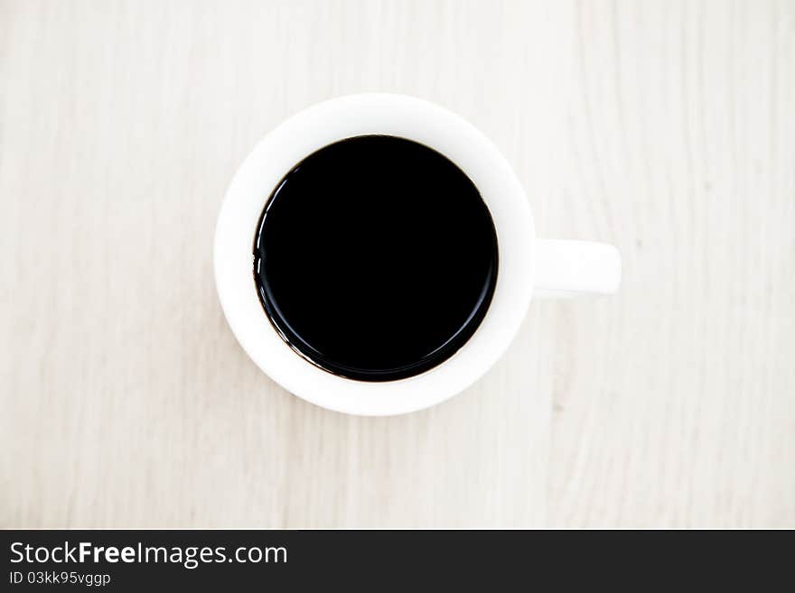 Coffee on a wooden table background. Coffee on a wooden table background