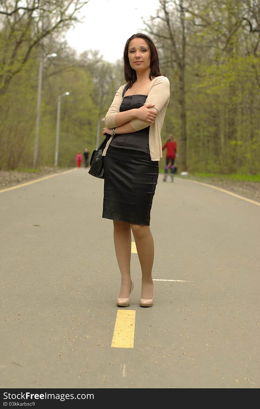 Female walking in a park in spring. Female walking in a park in spring