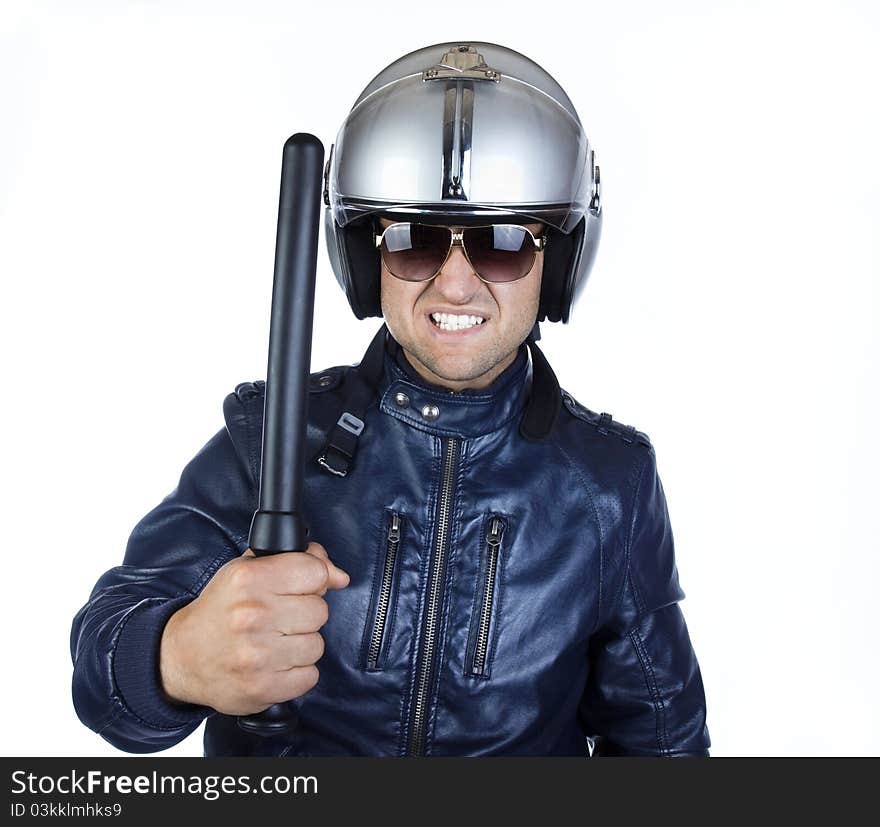 Police officer in aggressive posture, using his night stick. Police officer in aggressive posture, using his night stick.