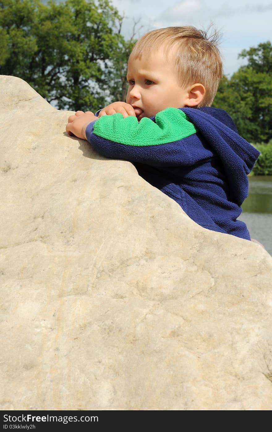 Boy on stone