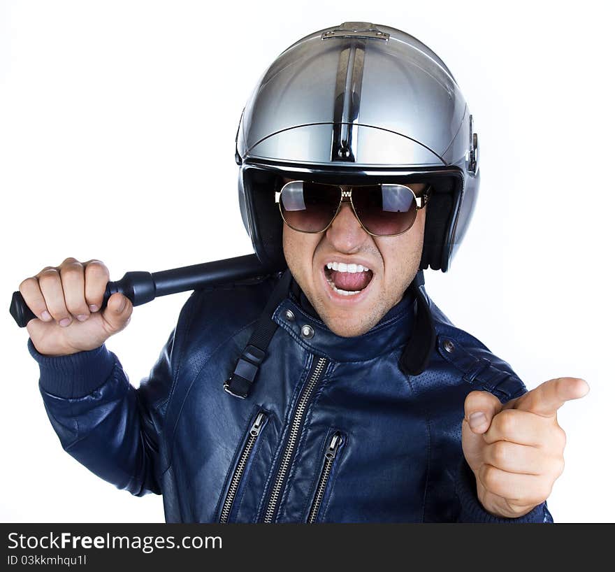 Police officer in aggressive posture, using his night stick. Police officer in aggressive posture, using his night stick.