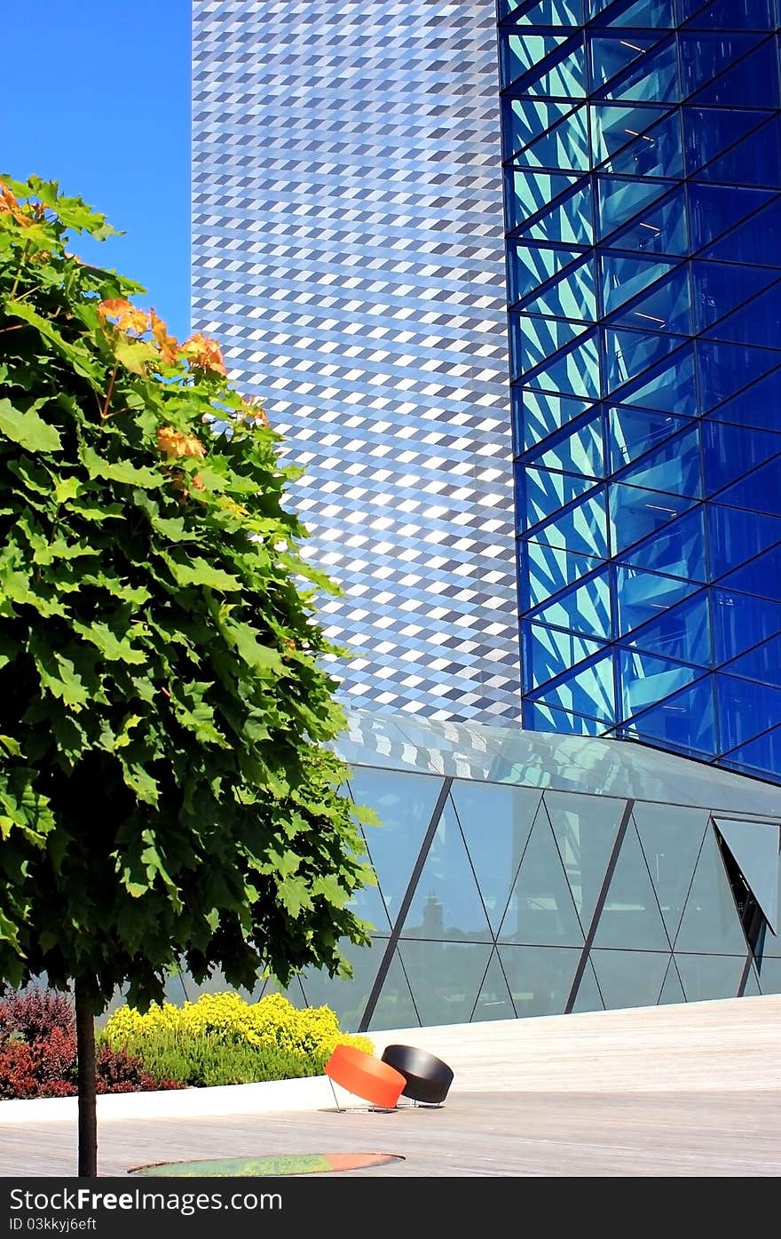 Two modern seats near modern building in Vilnius, Lithuania.