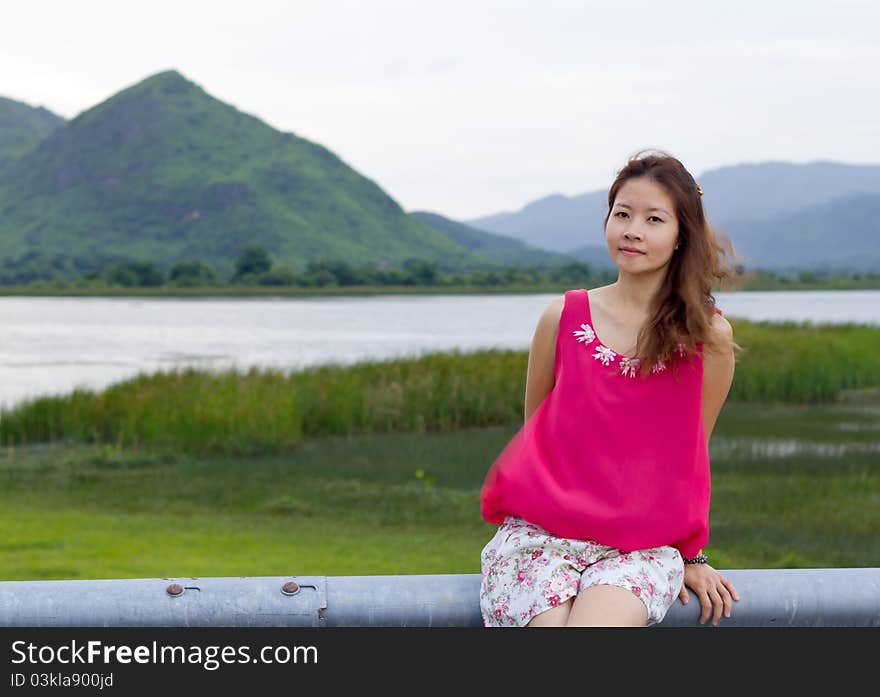 Asian girl and beautiful landscape