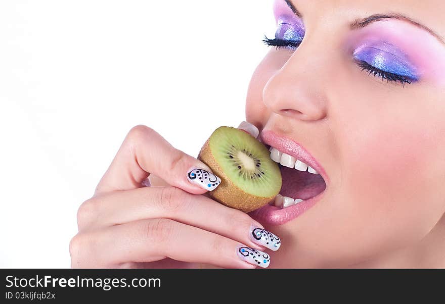 Close up photo of a women with kiwi