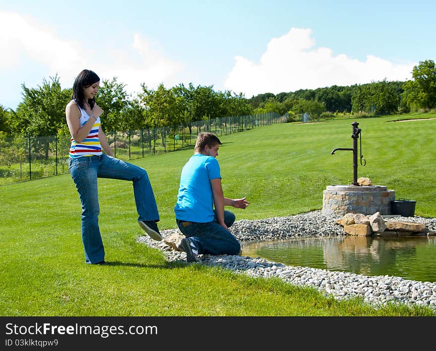 Young people having fun on the grass