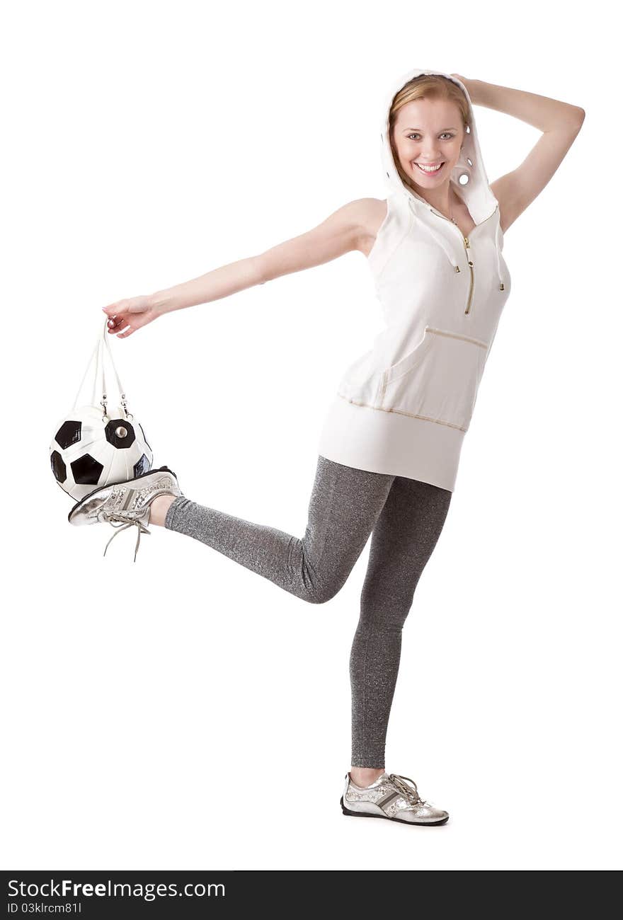 Young blond woman with a bag shaped like a soccer ball. Isolated on white background. Young blond woman with a bag shaped like a soccer ball. Isolated on white background