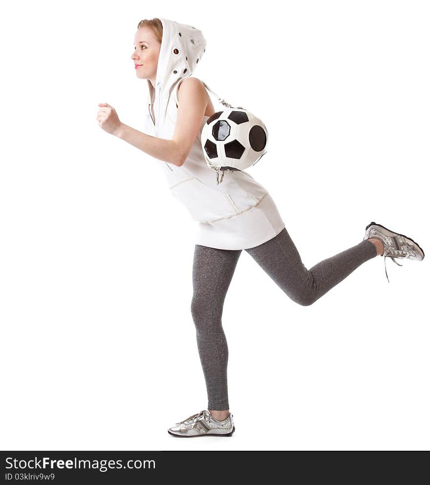 Young blond woman with a bag shaped like a soccer ball. Isolated on white background. Young blond woman with a bag shaped like a soccer ball. Isolated on white background