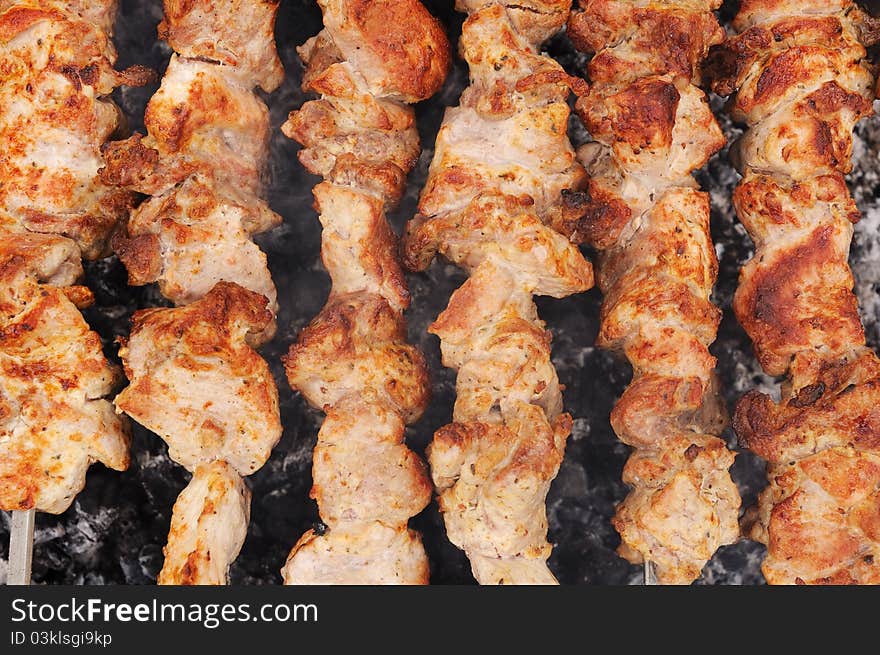 Pieces of ready meat on barbecue