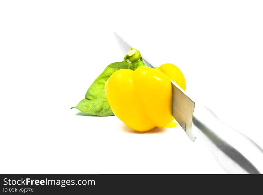 Yellow Sweet Pepper with Knife Isolation with white background. Yellow Sweet Pepper with Knife Isolation with white background