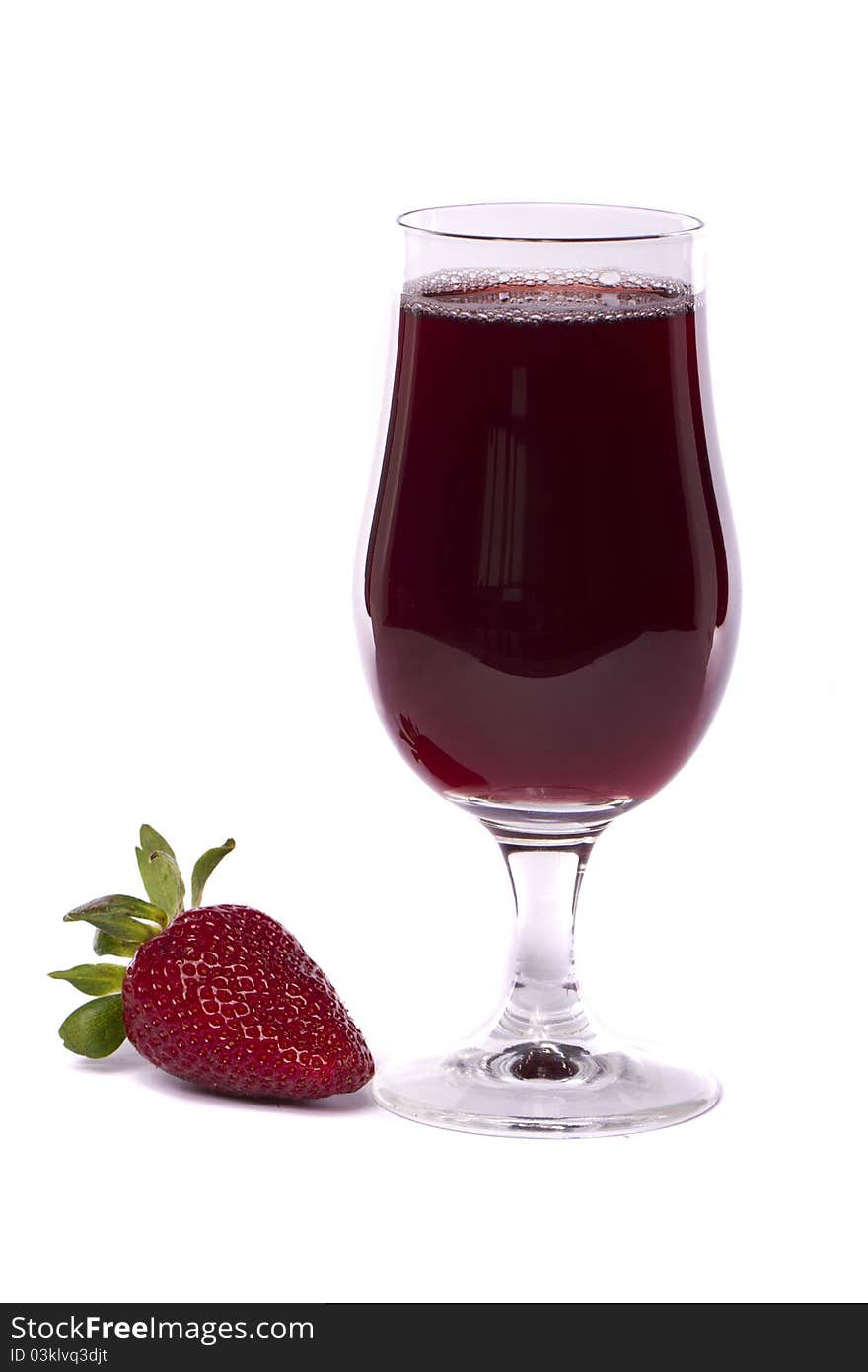 Close view of a glass of strawberry juice isolated on a white background.