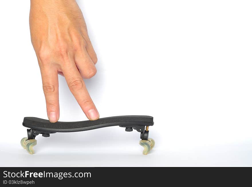 Fingers standing on a violin holder. Male hand. Fingers standing on a violin holder. Male hand.