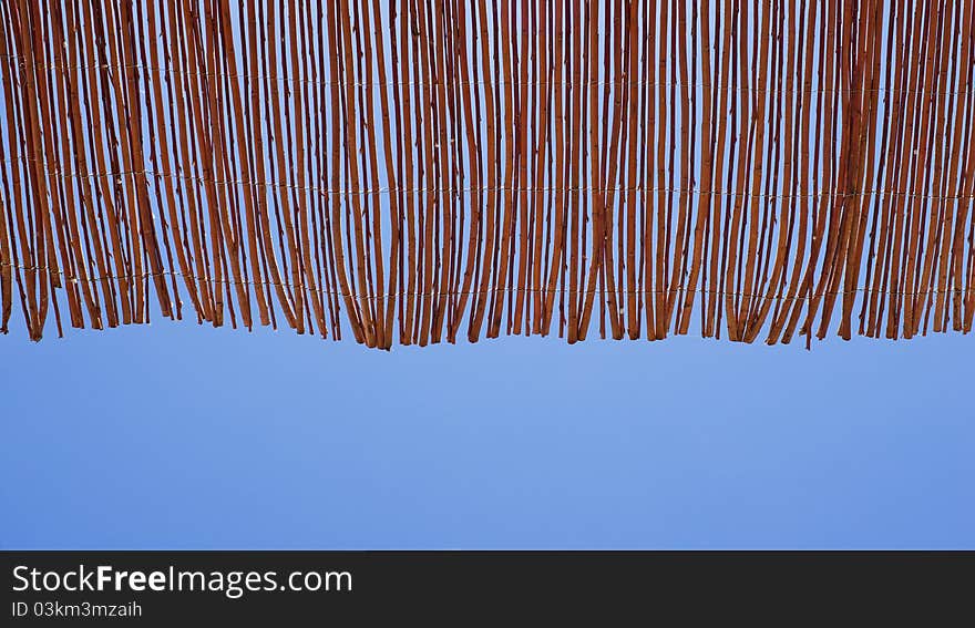 Sitting under a reed roof in tropical holidays. Sitting under a reed roof in tropical holidays