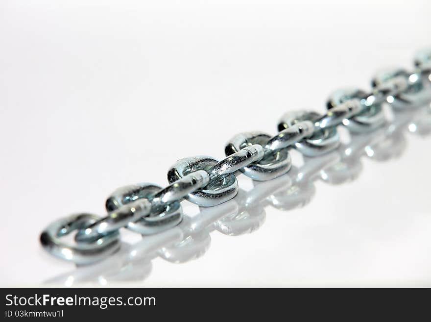 Chain macro on cold brushed metal