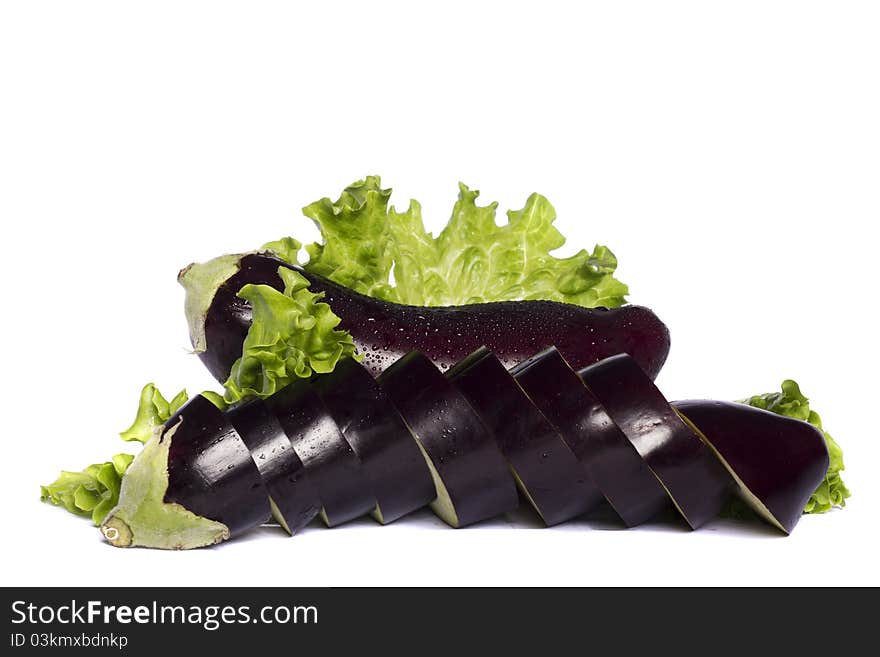 Close up view of an eggplant vegetable isolated on a white background. Close up view of an eggplant vegetable isolated on a white background.