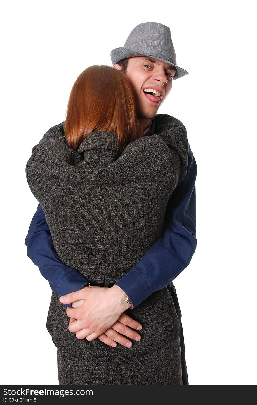 Hugging couple''s portrait isolated on white background