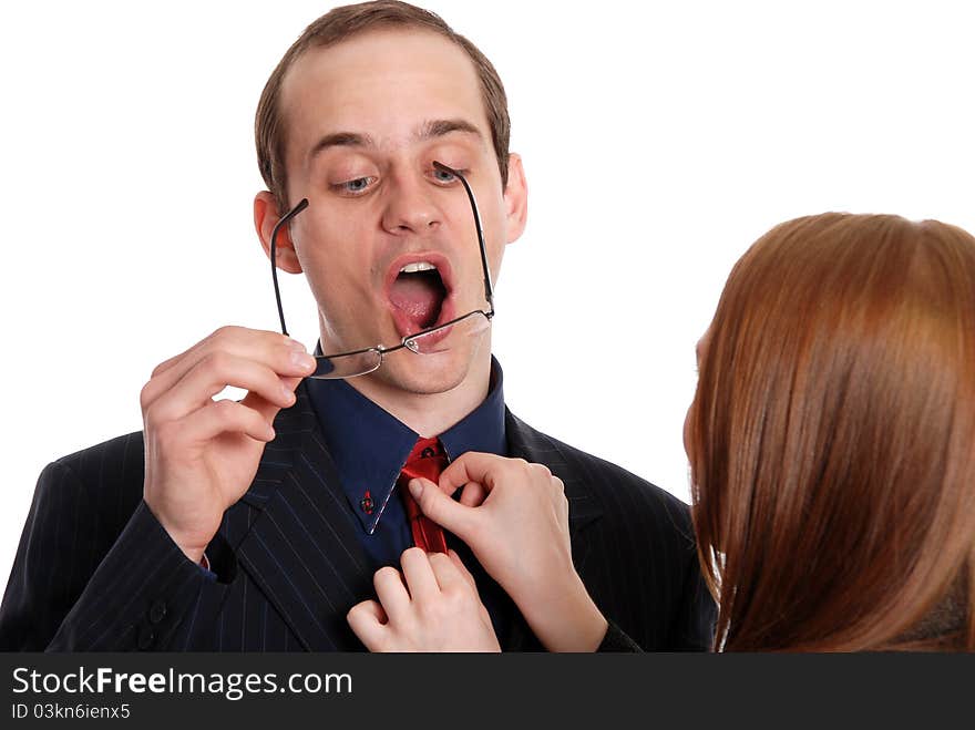 Young woman tries on glasses to the businessman isolated on white background