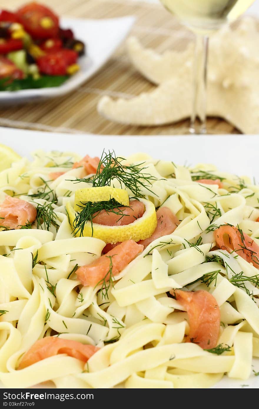 Tagliatelle pasta with salmon, anise and lemon