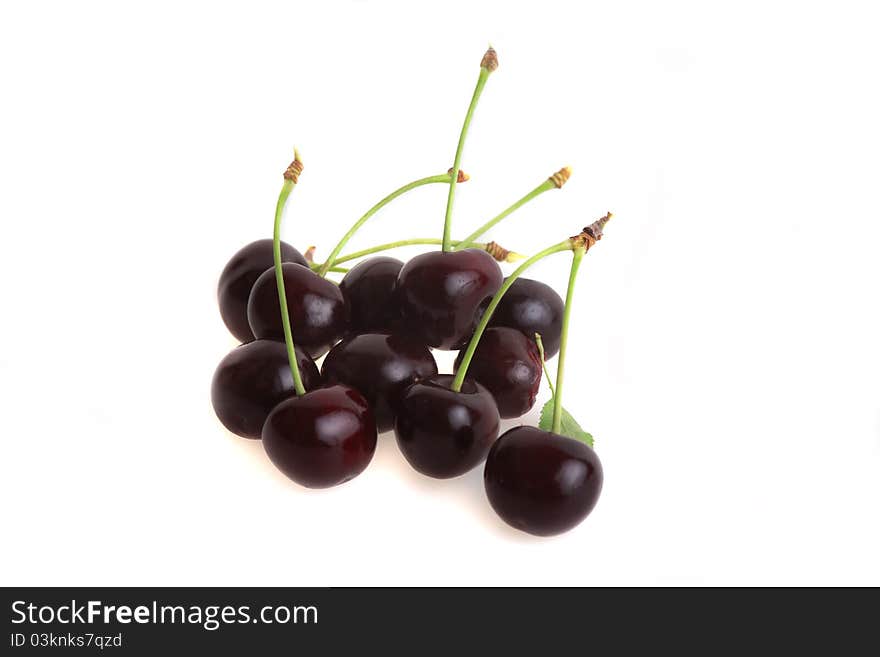 Heap of black cherries isolated