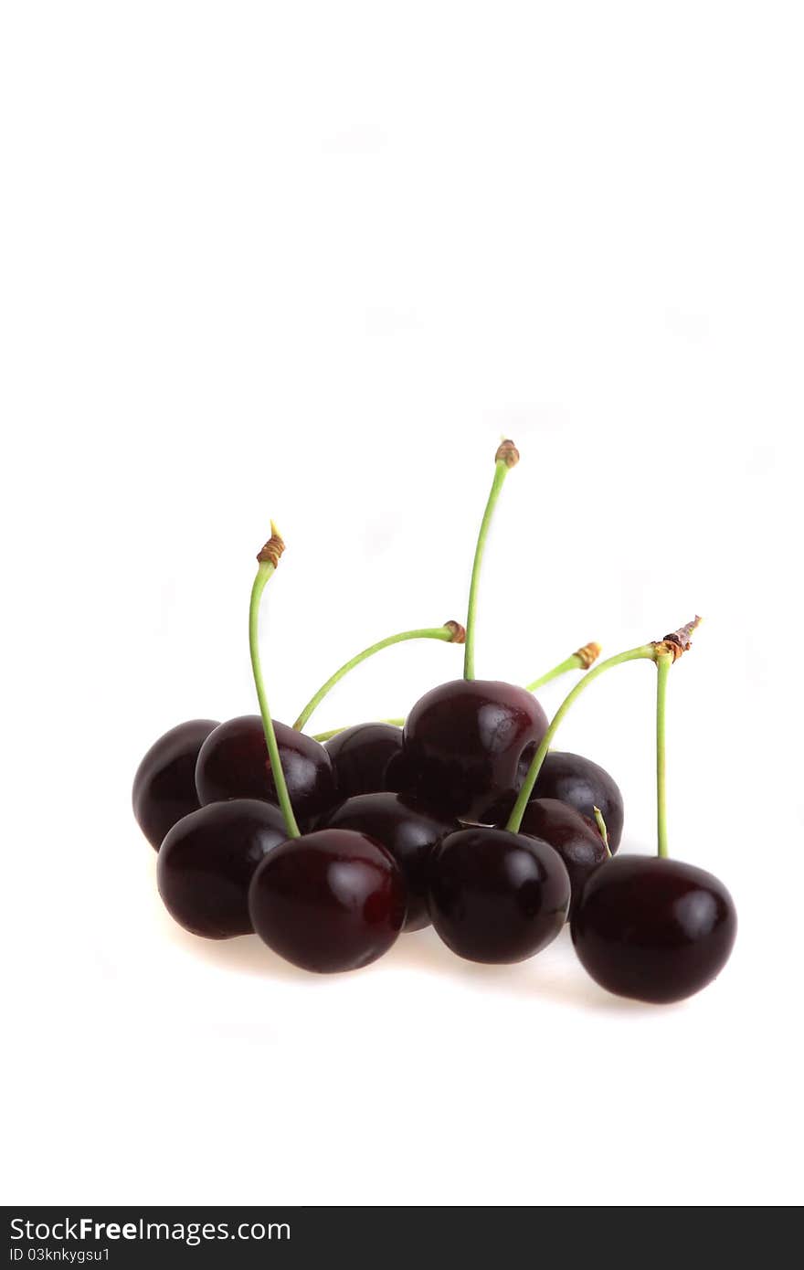 Heap of black cherries isolated